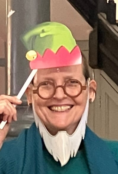 Barbie dressed up as a Christmas Elf